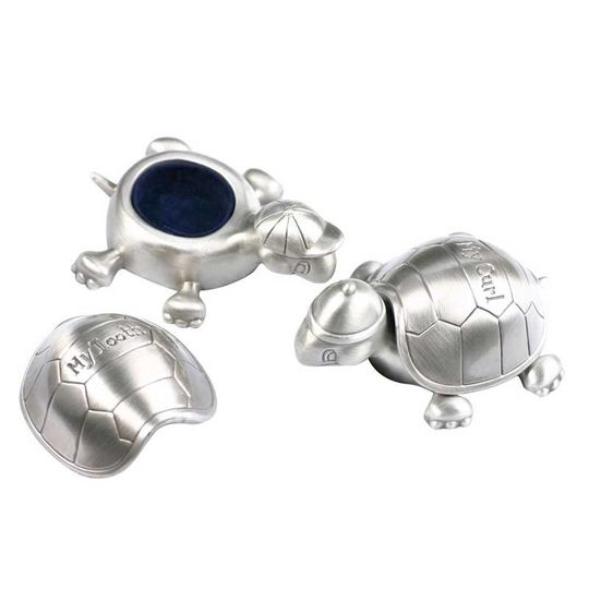 Skildpadder, min første tand og hårlok i fortinnet